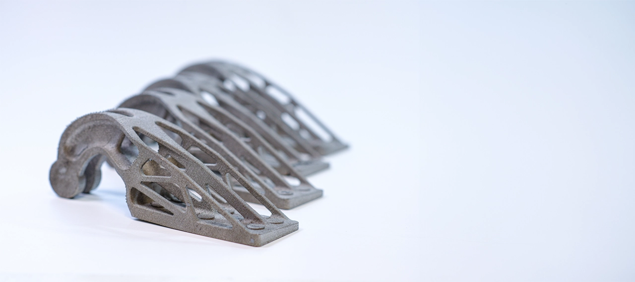 Detailed close-up of an additive manufactured metal bar.